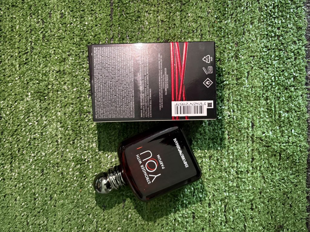 Emporia Armani Stronger With You Parfum, a fragrance for men featuring notes of vanilla, chestnut, and leather.The product pictured is the 3.3 oz / 100 ml size.